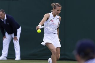 Viktorija Golubic, ici en action à Wimbledon l'an dernier, a signé une troisième victoire de rang à Birmingham après ses deux succès en qualifications ce week-end. KEYSTONE/PETER KLAUNZER